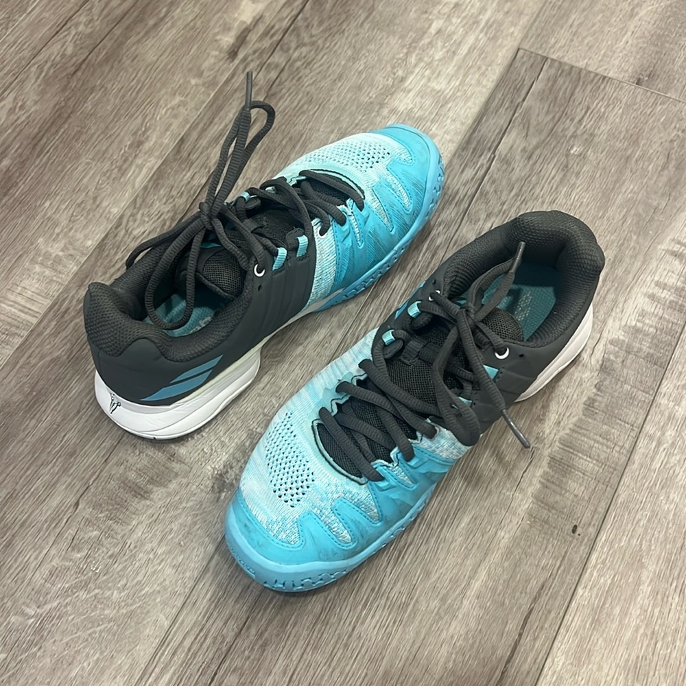 Babolat tennis shoes in light blue with pattern detailing